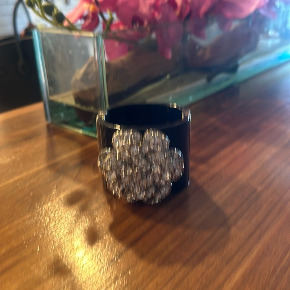 Elegant Black Cuff Bracelet with Crystal Flower